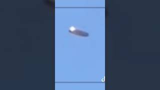 Watch Metallic silver craft spotted in broad daylight #UFOs #shorts