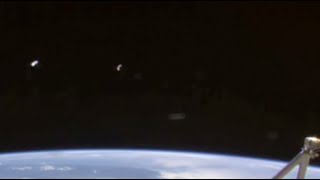 Watch UFO Sighting with Glowing Lights above Earth's Surface (ISS) - FindingUFO