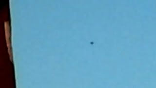 Watch Black Circular UFO Hovering Slowly above Houses in Reutlingen, Germany - FindingUFO