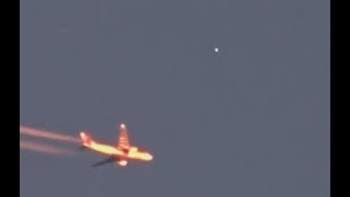 Watch UFO Captured Flying Over A Airplane In Curitiba, Brazil. April 20, 2019