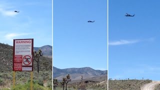 Watch Black Hawk Helicopter Buzzed Tour Group at Front (Line) Gate of Area 51 - FindingUFO