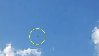 Watch UFO Sighting Black Colored Vanishing into Clouds in Alger, Algeria - FindingUFO