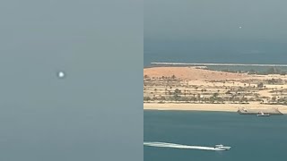 Watch White Spherical UFO Captured Hovering over Abu Dhabi in United Arab Emirates