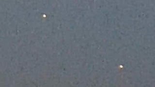 Watch Multiple Bright UFOs in Formation and Fast Appearing Craft over Galveston Bay, Texas - FindingUFO