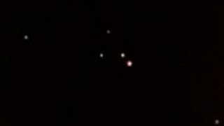 Watch UFO Sighting with Colored Lights Formation above Singapore - FindingUFO