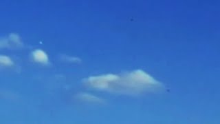 Watch Multiple Dark Coloured Saucer Shaped UFOs in Triangle Formation over Melbourne, Australia