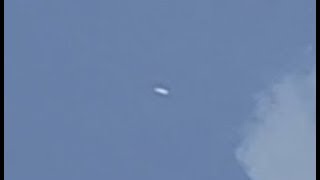 Watch Cigar Shaped Craft Filmed Racing For Cloud Cover Over Wexford County, Michigan. May 25, 2019