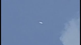 Watch Cigar Shaped Craft Filmed Racing For Cloud Cover Over Wexford County, Michigan. May 25, 2019