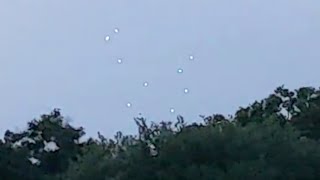 Watch Strange Group of Bright Glowing UFO Orbs Sighted Hovering over Tampa Bay, Florida