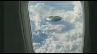 Watch Disk Shaped UFO Saucer Filmed by Passenger from Airplane - FindingUFO