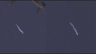 Watch Snake Like UFO Spotted Passing An Airplane Over Carson, California. May 7, 2022