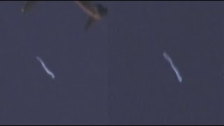 Watch Snake Like UFO Spotted Passing An Airplane Over Carson, California. May 7, 2022