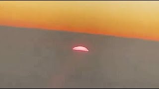 Watch The Sun Appears To Set Between The Clouds, Filmed During A Flight From Queensland To Japan