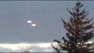 Watch UFO Sighting with Glowing Lights Disappears into Clouds over Ontario, Canada - FindingUFO