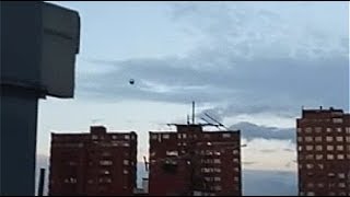 Watch Sliver Sphere Shaped UFO Caught Flying Over The Rooftops Of Apartments In Bogota, Colombia